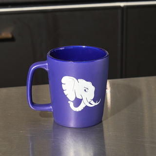 Purple ceramic coffee mug with an elephant graphic.