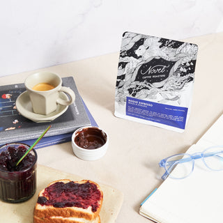 Rogue Espresso blend at a breakfast table with toast, berry jam, and melted chocolate.