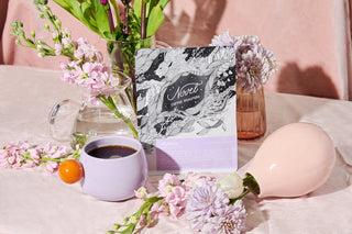 bag of uganda coffee with flowers